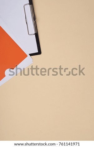 light background, two folders in the corner.
