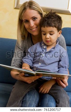 mother and son with a book