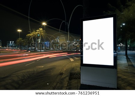 Blank white advertisement lightbox at night. Design mock-up. Horizontal.