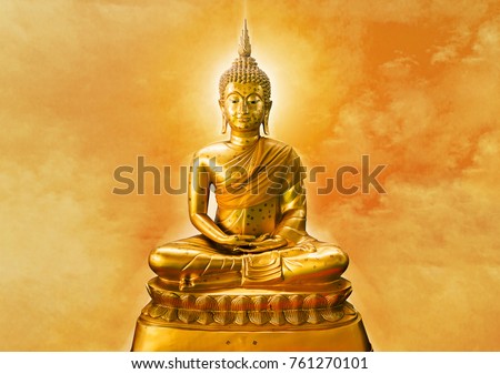 Buddha statue with aura on yellow sky background Royalty-Free Stock Photo #761270101