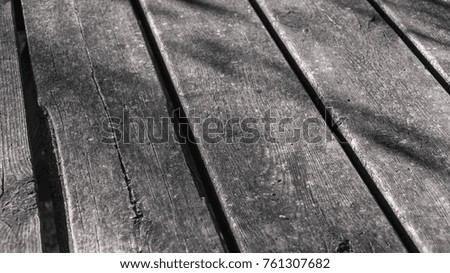 Detail of a wooden plank table. San Lorenzo del Escorial, Madrid, Spain