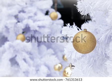 Gold christmas ball on white background