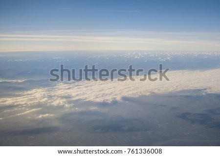 Above the clouds, photo from the plane.