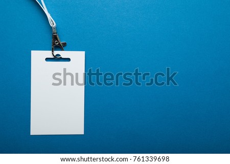 Blank badge template with strap key blue background