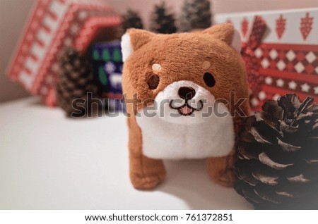 Year of the dog. r of the dog. Toy dog on New Year's background (Japanese style dog - icon in Asia)