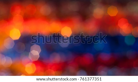 Abstract Christmas background, glass toys and tinsel out of focus, bright bokeh