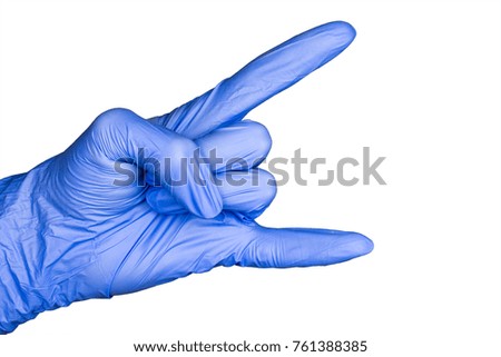 hand gesture in blue medical glove isolated, close up, selective focus, white background