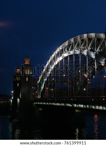 Petersburg Russia. Bolsheokhtinsky bridge at night over Neva river.