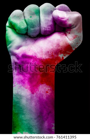 a fist with painted paints