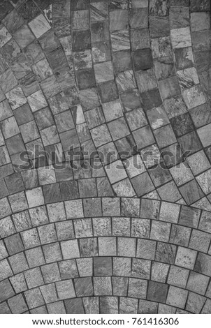 Monochrome Photograph of Square Tiled Wall with Pattern and Texture.