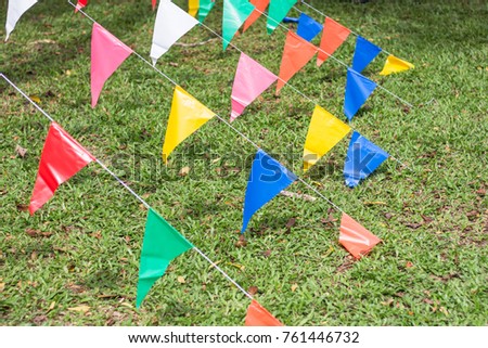 
Colorful flags decorate the celebration.