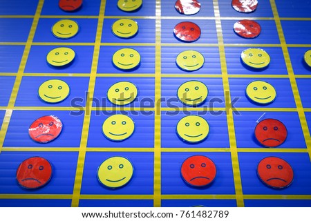 Yellow and Red Smile Face on blue background.