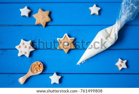 gingerbread cookie ready for decoration, confectionery and pipping bag with glaze Royalty-Free Stock Photo #761499808