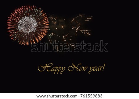 Fireworks on a dark background and a text "Happy New year".