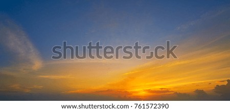 Colorful sunset sky in blue and orange colors