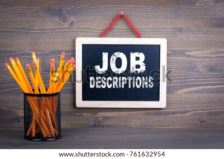 Job Descriptions. Career and success concept. Chalkboard on a wooden background
