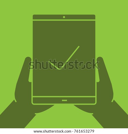 Hands holding tablet computer glyph color icon. Silhouette symbol. Tablet computer with check mark. Negative space. Raster isolated illustration