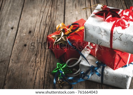 Christmas gift boxes, old rustic wooden background, copy space