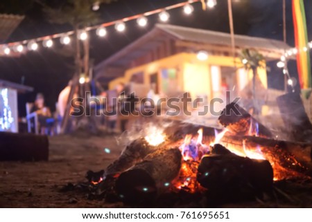 Blurry image, Bonfire and outdoor patio string light set for happy and funny time to party Royalty-Free Stock Photo #761695651