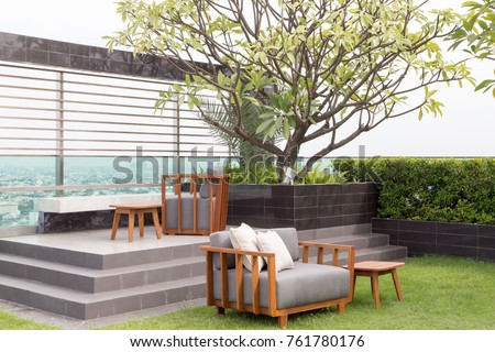 Modern roof top with sofa and furniture Royalty-Free Stock Photo #761780176