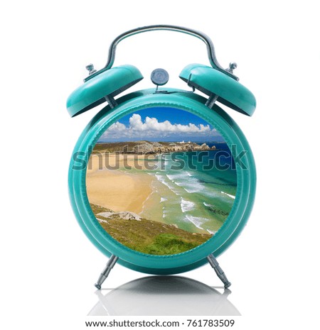 isolated alarm clock with beach dial on white background