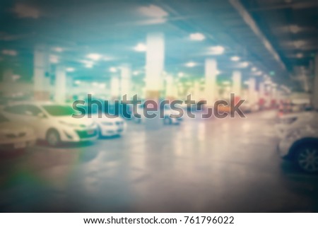 Abstract blur and retro parking car indoor for background