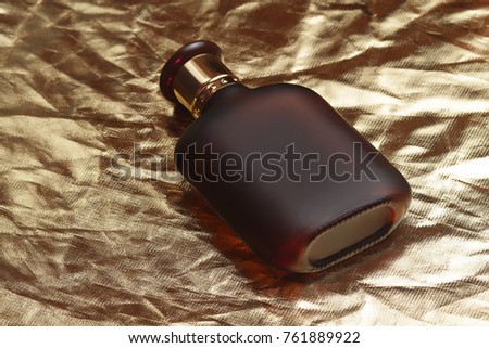 A bottle of male perfume Royalty-Free Stock Photo #761889922