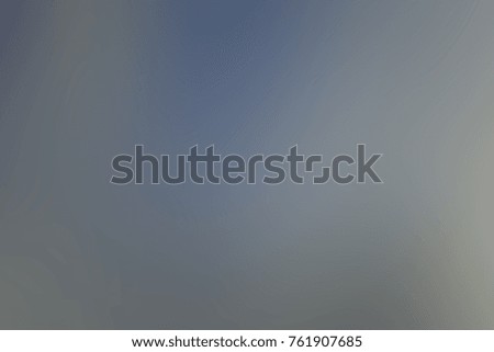 Abstract blurred gray, white and blue background out of focus for design