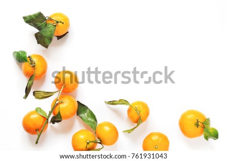 Fruit mock-up. Orange tangerines on a white background. Citrus on the table. Flat lay food styling. Top view stock photo, copy space