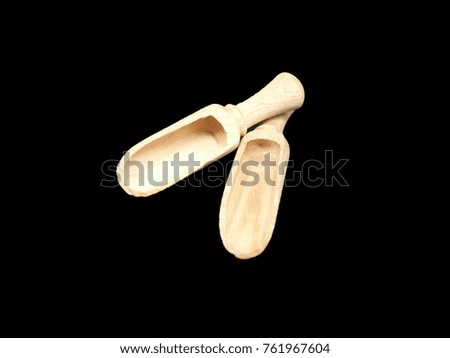two wooden handmade rustic scoop isolate in black background