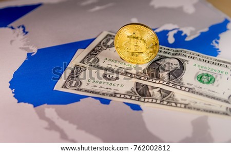 Bitcoin and padlock over US dollar blls and map.Situation of Bitcoin and other cryptocurrencies in USA concept
