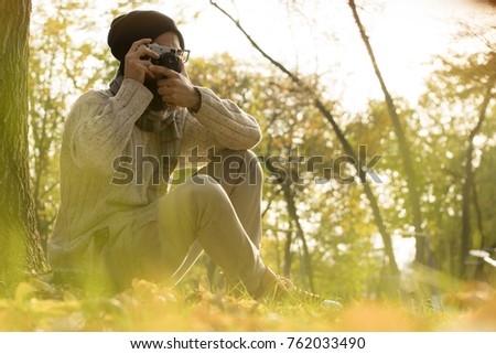 Photographer with vintage photo camera