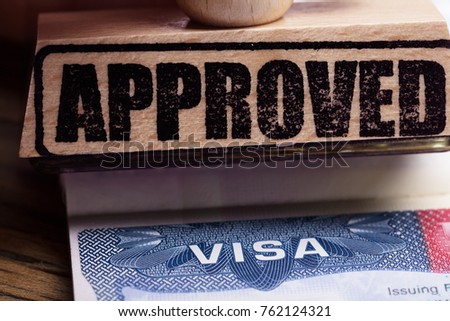 Close-up Photo Of Approved Stamp On Visa Royalty-Free Stock Photo #762124321