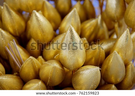 Closeup Golden lotus flowers for praying buddha.