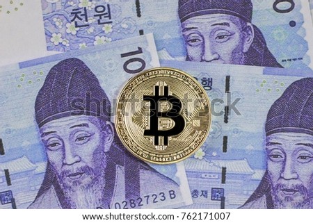 Silver Bitcoin on South korea banknote background