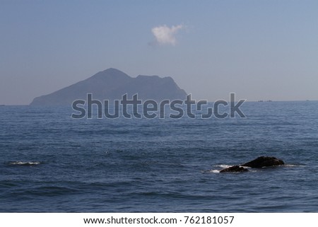 The Guishan Island (Turtle Island) nearby northeast Taiwan and the blue ocean.