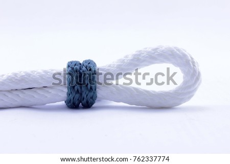 String knotted on a white background