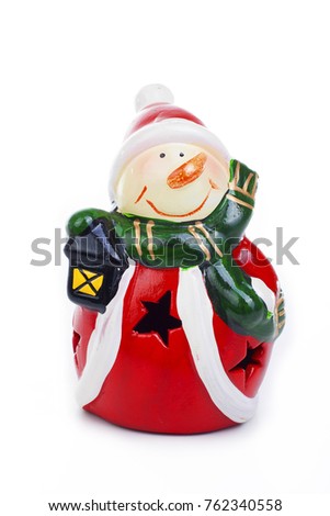 Santa Claus snowman Christmas decoration.. Christmas figurine on isolated white background. Studio photo.