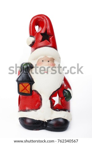 Santa Claus Christmas decoration.. Christmas figurine on isolated white background. Studio photo.