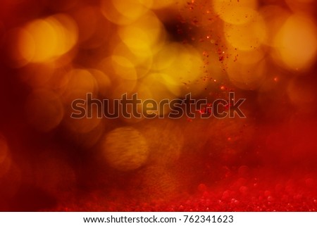 christmas background, red glitter dropped with golden background