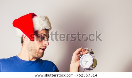 beautiful bearded man in hat santa
