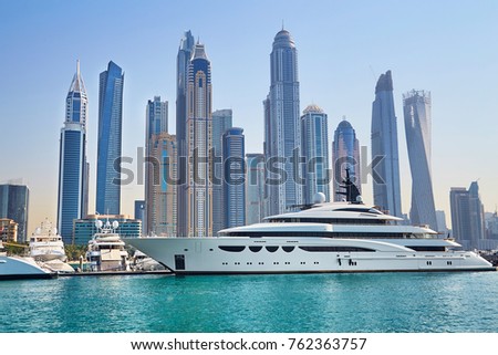 Scenic view of Dubai Marina Skyscrapers with big boat, Skyline, View from sea, United Arab Emirates Royalty-Free Stock Photo #762363757