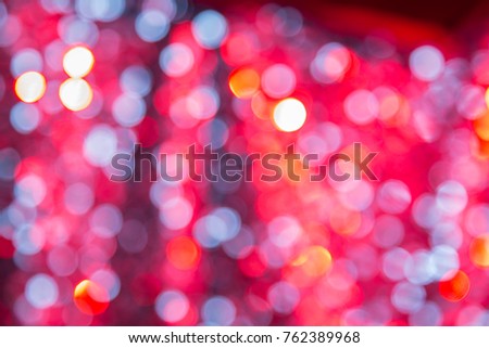 festive bright background with a bokeh of glowing lights. Christmas, New Year background. sign of love