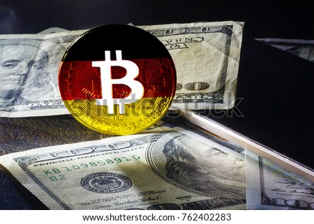 Bitcoin close up on keyboard background the flag of germany is shown on bitcoin