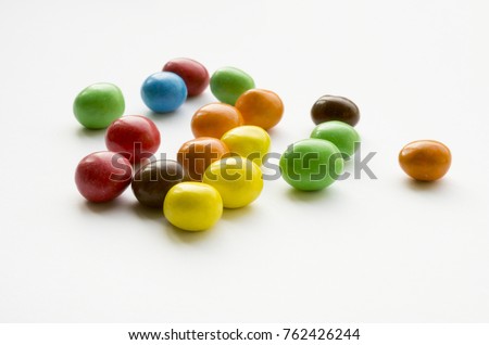 multicolored candy on white background