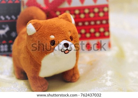 Year of the dog. Toy dog on New Year's background (Japanese style dog - icon in Asia)