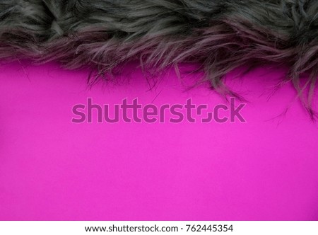 artificial fur strip on a pink background