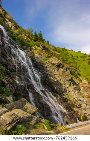 Capra waterfall on the course of the river Capra by the famous road Transfagarasan in Arges county, Romania