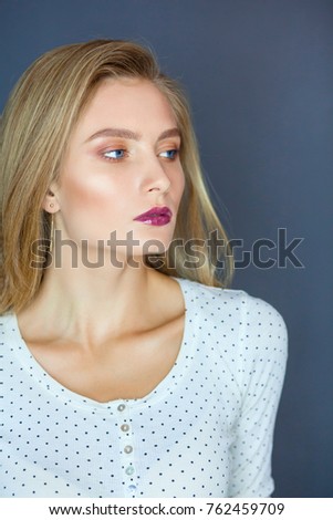 Young woman standing, isolated on white background. Young woman.