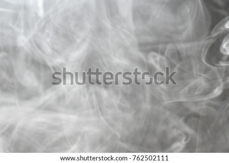 Smoke floating in the air on the texture background